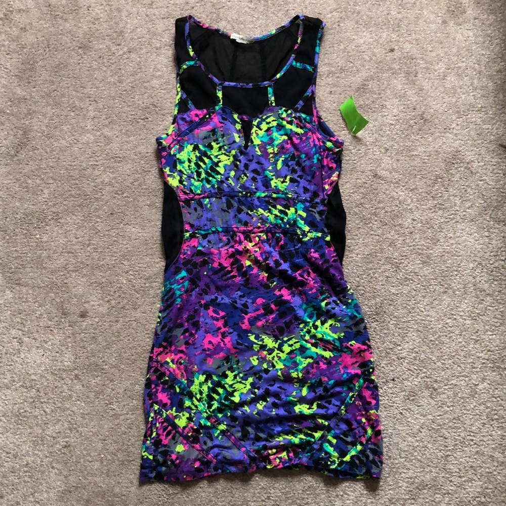 Never worn, tag still attached. Mini dress.